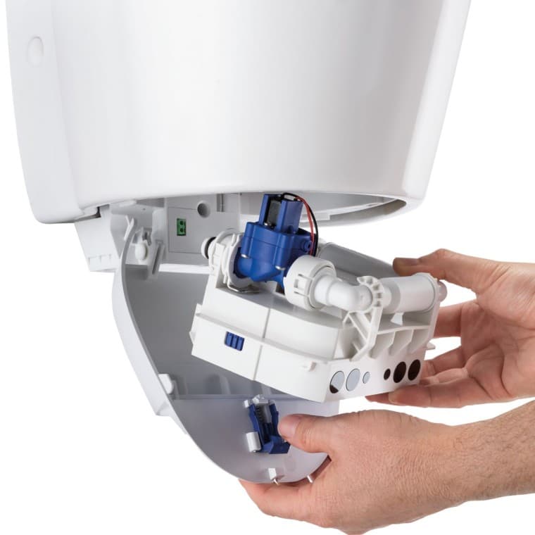 Řídicí jednotka pisoáru Geberit v dokovací stanici Řídicí jednotka pisoáru Geberit v dokovací stanici